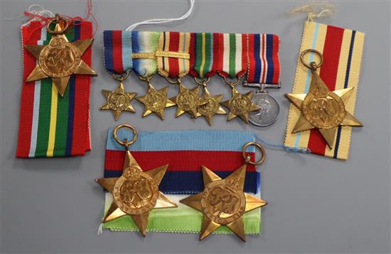 A WW2 medal group of six to Lieut. G.I.L. Greenlees RNVR and matching miniatures